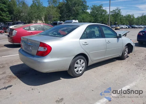 2002 Toyota Camry Le from USA, damaged, VIN 4T1BE32K32U029669